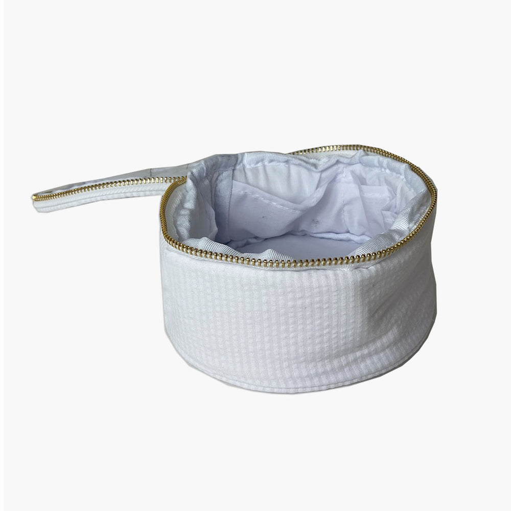 white seersucker jewelry bag