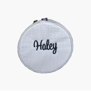 white seersucker jewelry bag